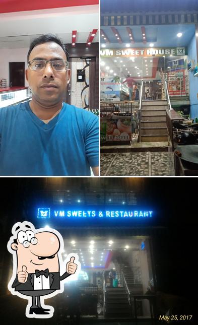Look at this picture of VM Sweets Shop