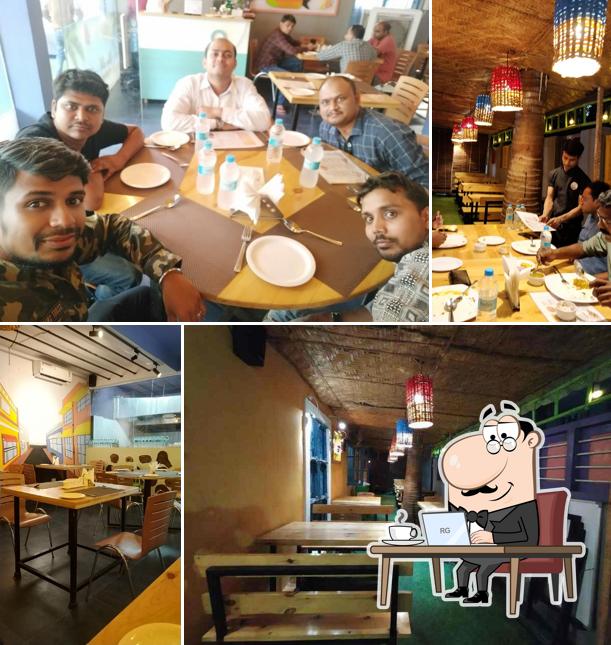 Take a seat at one of the tables at Pondy Parottas