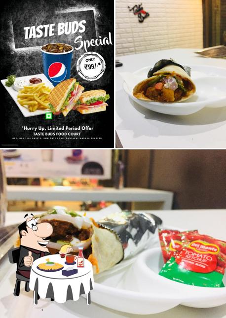 Order a burger at Taste Buds