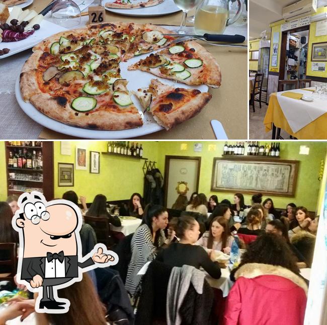 La immagine della interni e pizza di Al Cantuccio Ristorante Pizzeria