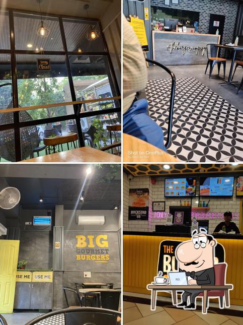 Take a seat at one of the tables at THE BURGER COMPANY