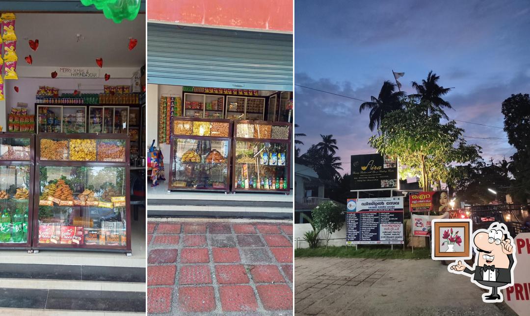 Take a seat at one of the tables at S S BAKERY & SWEETS