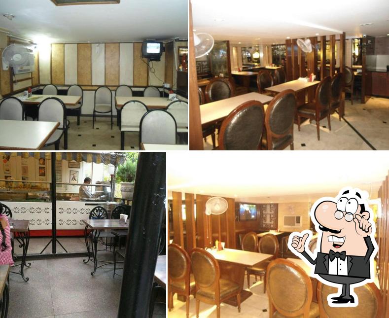 Take a seat at one of the tables at Mithapur