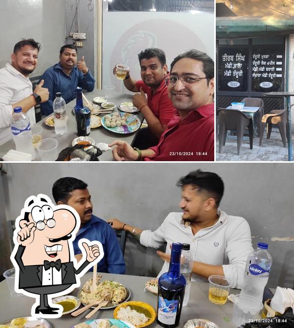 Among various things one can find interior and food at ਤੀਰਥ ਸਿੰਘ ਮੱਛੀ ਵਾਲਾ