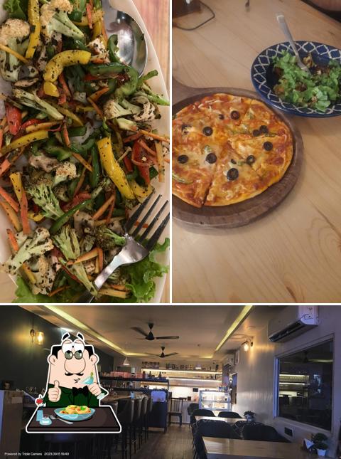 Check out the photo showing food and interior at Brew tale cafe
