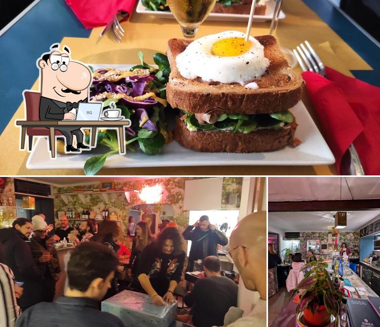 Dai un’occhiata alla immagine che mostra la interni e cibo di Qui in vanchiglia