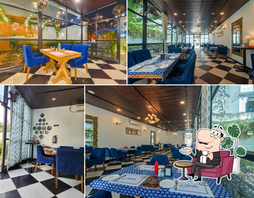 Take a seat at one of the tables at Jashn