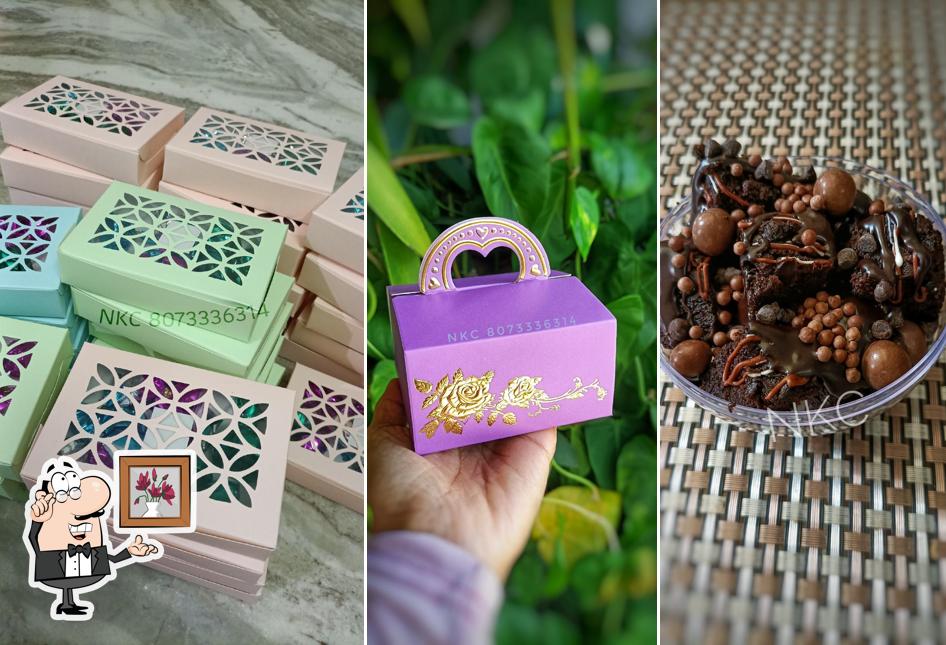 Take a seat at one of the tables at NKC HOMEMADE CHOCOLATES #hubli