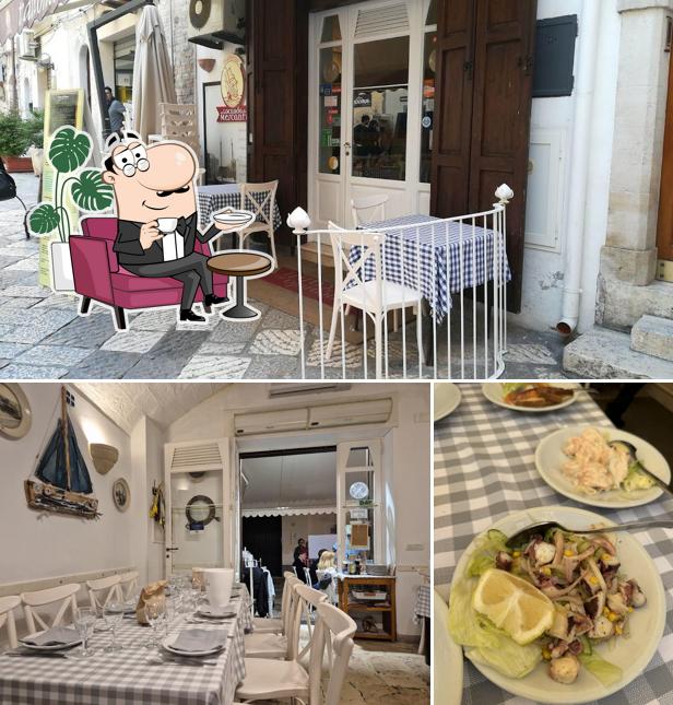 Dai un'occhiata agli interni di Trattoria La Locanda dei Mercanti