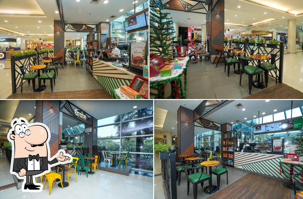Take a seat at one of the tables at Chaayos Cafe - Viviana Mall, Thane