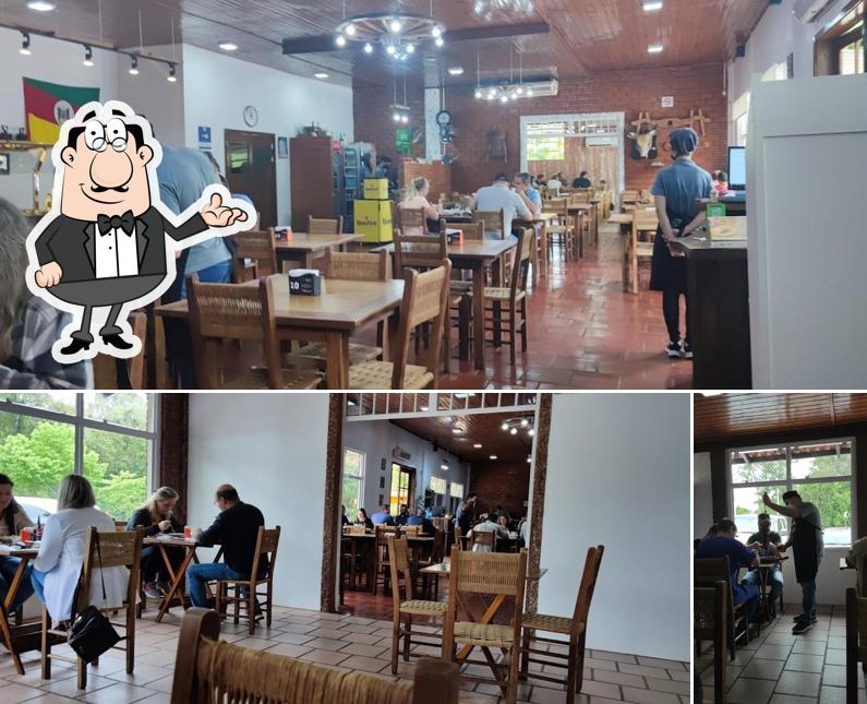 O interior do Restaurante Galpão DI