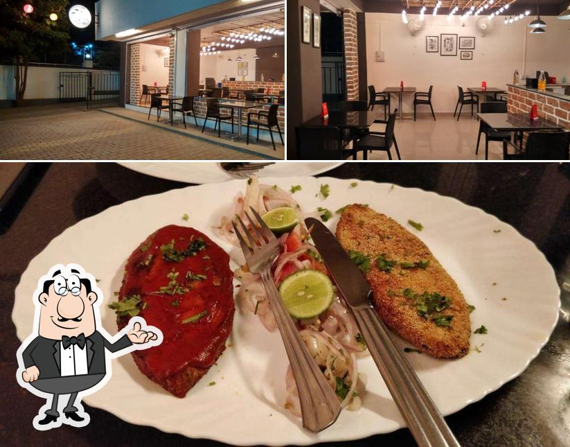 Take a seat at one of the tables at Cafe Goa