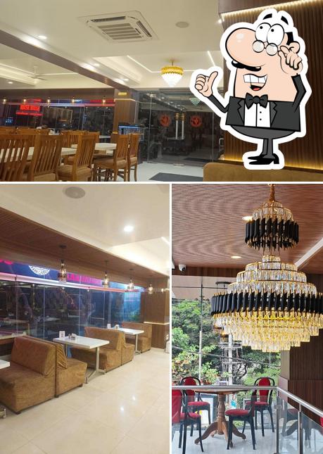 Take a seat at one of the tables at INDIAN COFFEE HOUSE/ICH & MULTICUISINE RESTAURANT, HSR LAYOUT, BANGALORE