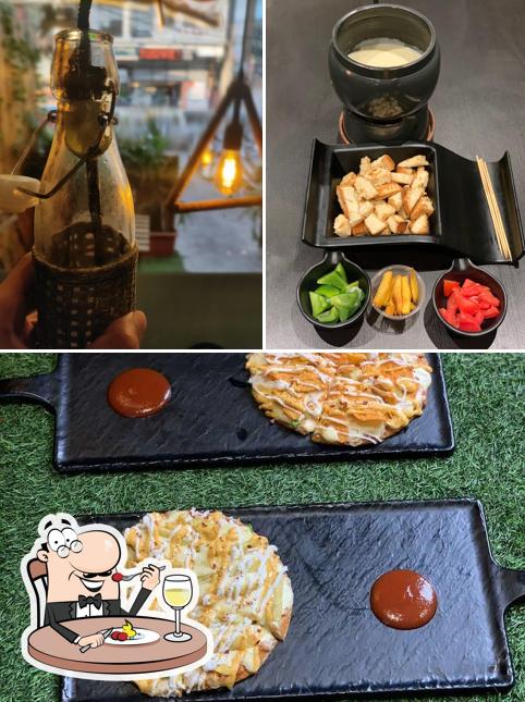 This is the picture displaying food and beer at The Nosh Bistro