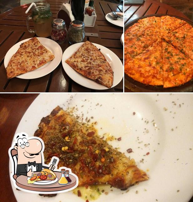 Try out pizza at Under The Banyan Tree