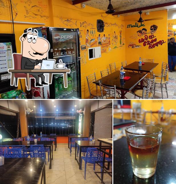 The picture of interior and beverage at Malik family restaurant