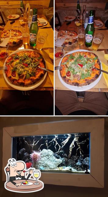 Questa è la foto che presenta la cibo e esterno di Terantiga