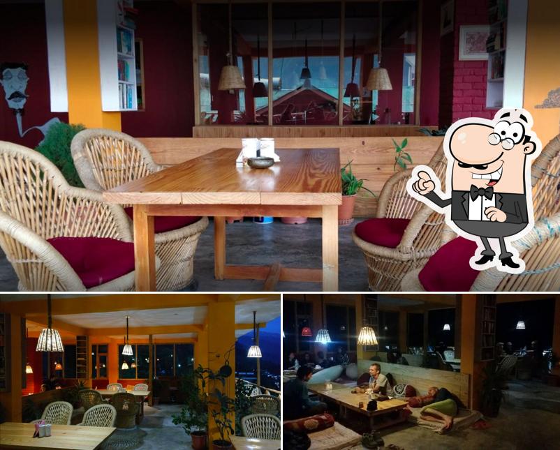 Take a seat at one of the tables at Rasta cafe manali