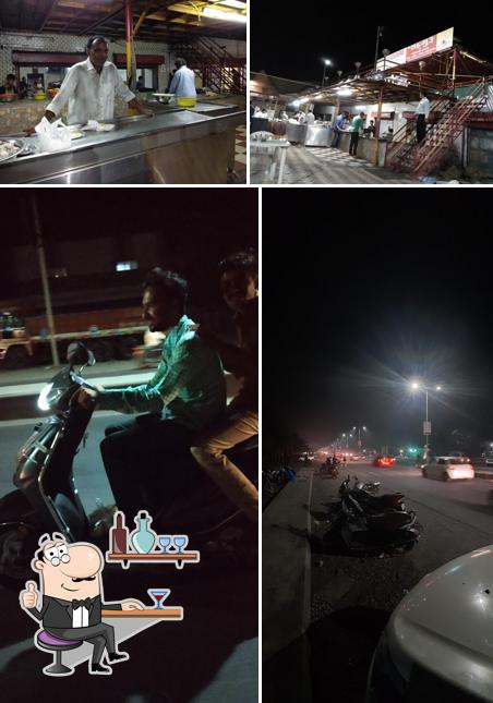 Take a seat at one of the tables at Sadguru Punjabi Dhaba