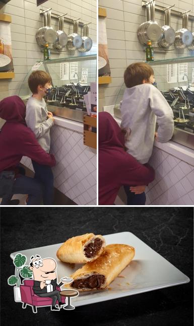 Esta é a imagem apresentando interior e sobremesa no Restaurante Spoleto