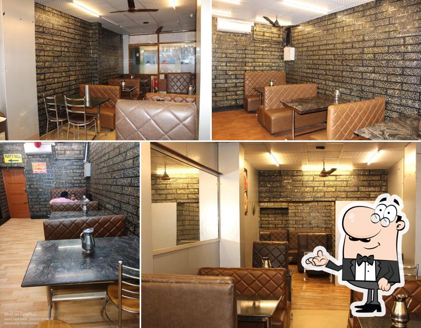 Take a seat at one of the tables at Mayuri Hotel & Bakery