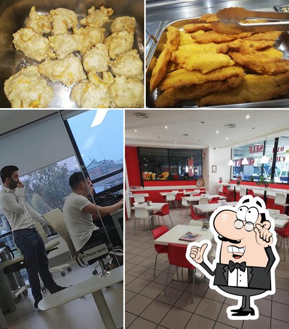 Siediti a un tavolo di Oasi Caffè