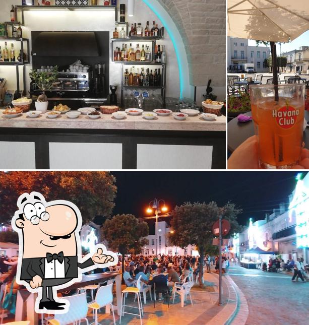 Guarda la foto che raffigura la interni e birra di Caffè Marconi