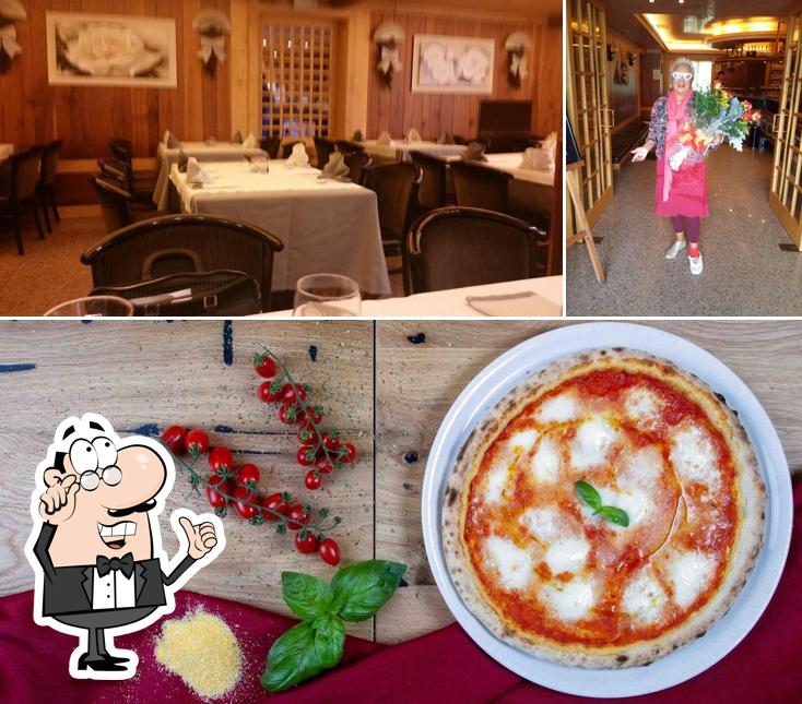 Guarda la immagine che mostra la interni e pizza di Pizzeria Ristorante Mistral