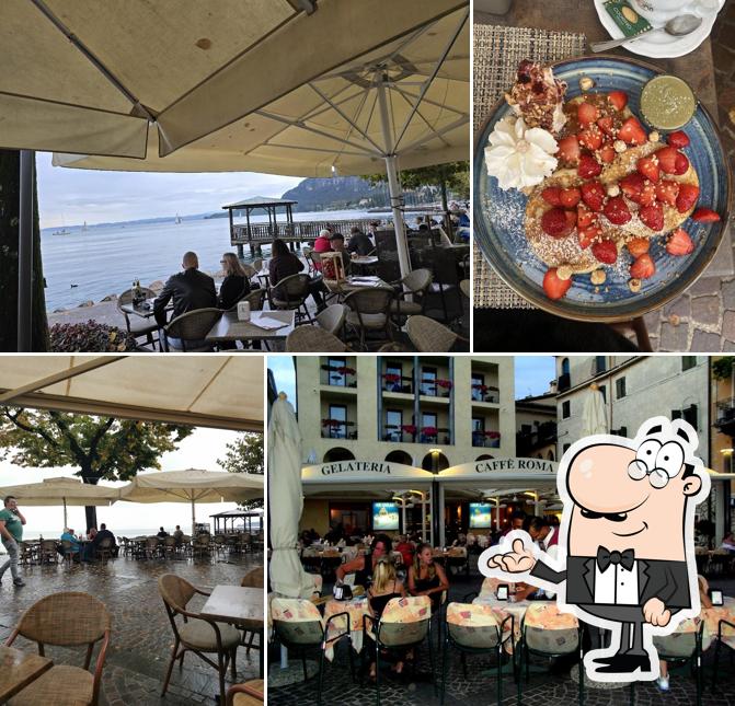 Siediti a un tavolo di Caffe Roma