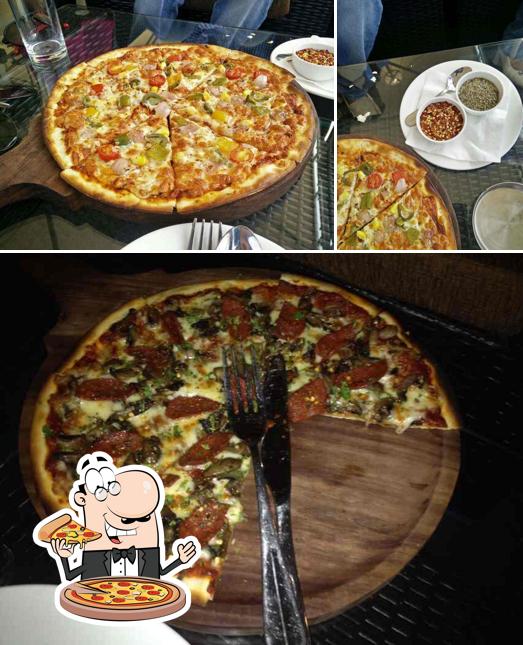 Try out pizza at Condoss