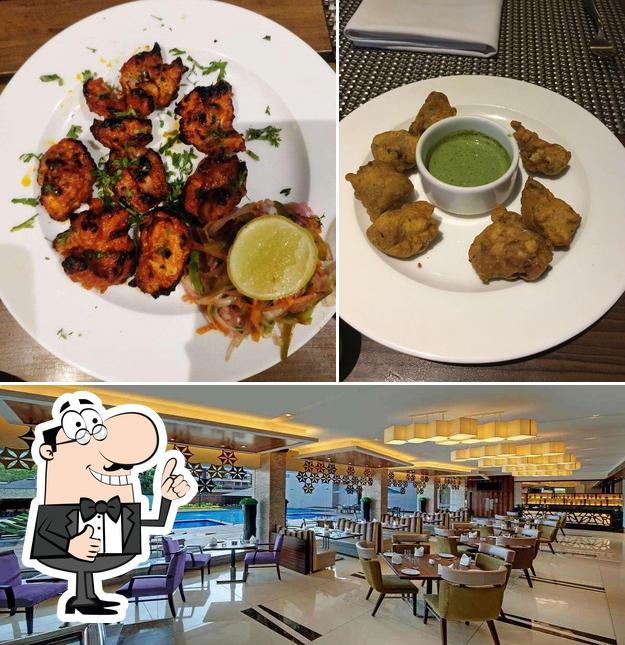 Here's a picture of Café Tinto - The Fern Kadamba