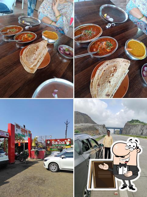 This is the picture depicting exterior and food at Hotel saiba