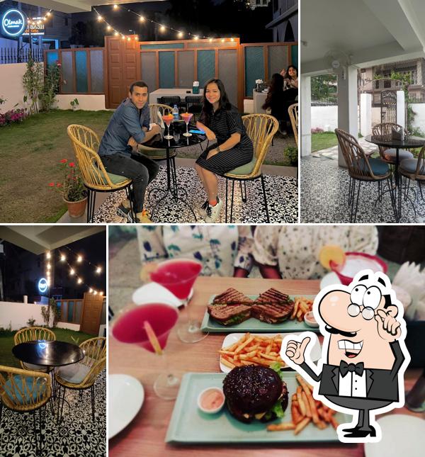 Take a seat at one of the tables at Olmak