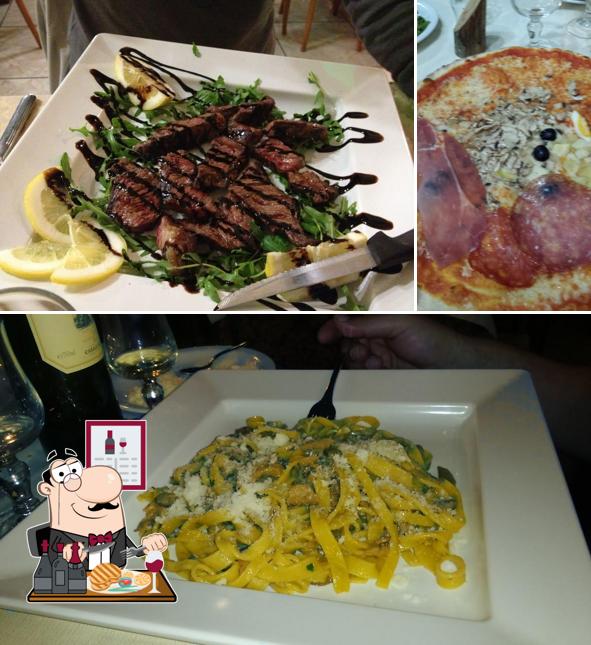 Prenditi i piatti di carne a Il Rifugio Dei Cacciatori Srl