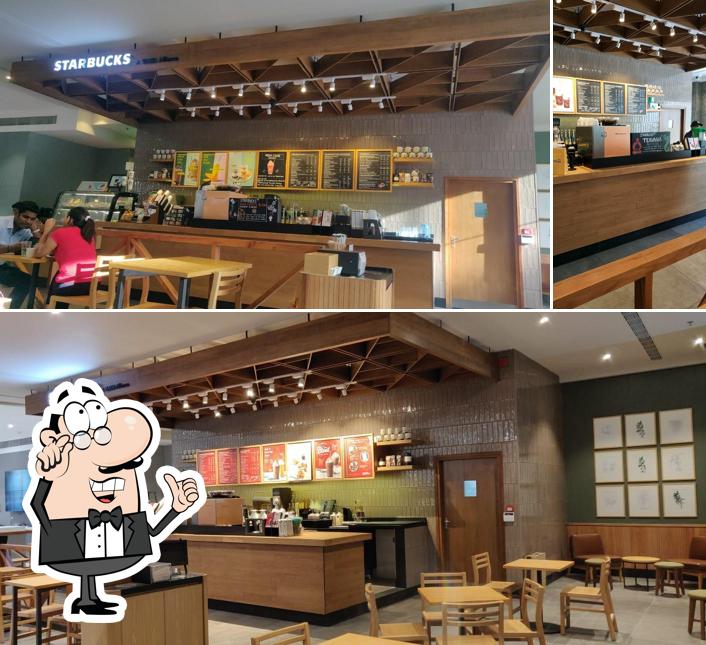 Take a seat at one of the tables at Starbucks