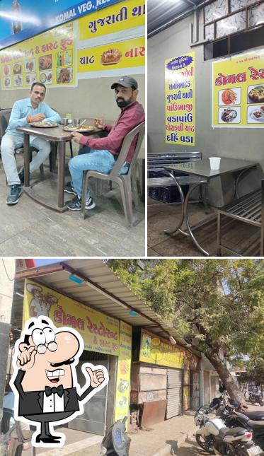The image of Komal Gujarati Restaurant’s interior and exterior