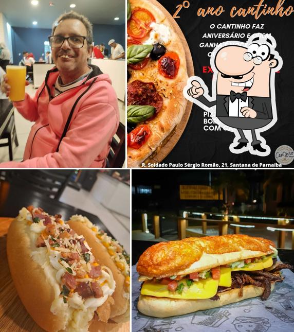 Sente em uma das mesas no Restaurante Cantinho Bom Demais