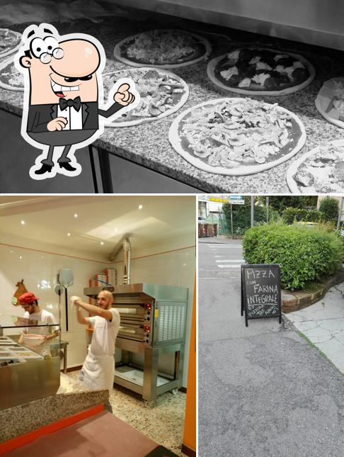 Tra le varie cose da Pizzeria Tre Archi si possono trovare la interni e lavagna