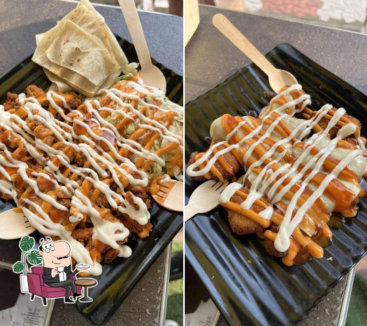 Take a seat at one of the tables at The Joint Shawarma & more