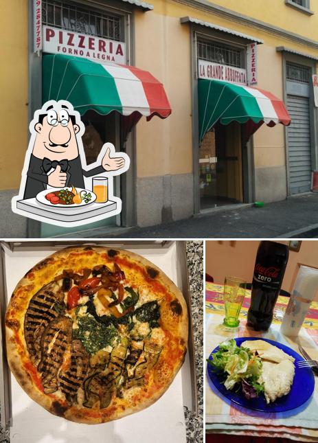 Dai un’occhiata alla immagine che mostra la cibo e esterno di La Grande Abbuffata pizzeria d' asporto