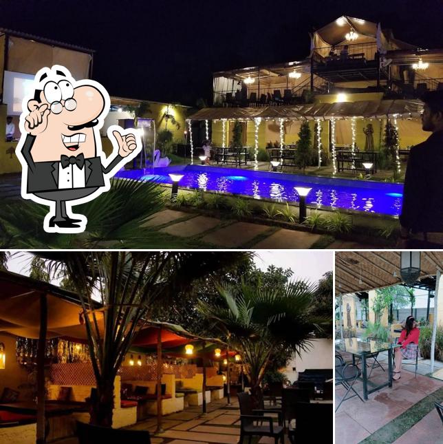 Take a seat at one of the tables at Hideout