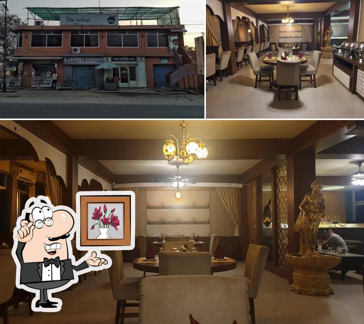 Take a seat at one of the tables at The Indian Restaurant