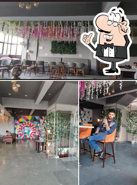 Take a seat at one of the tables at Urban Dhaba