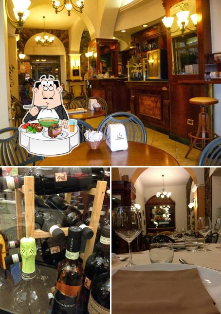 La foto di tavolo da pranzo e alcol da Caffè Diamante