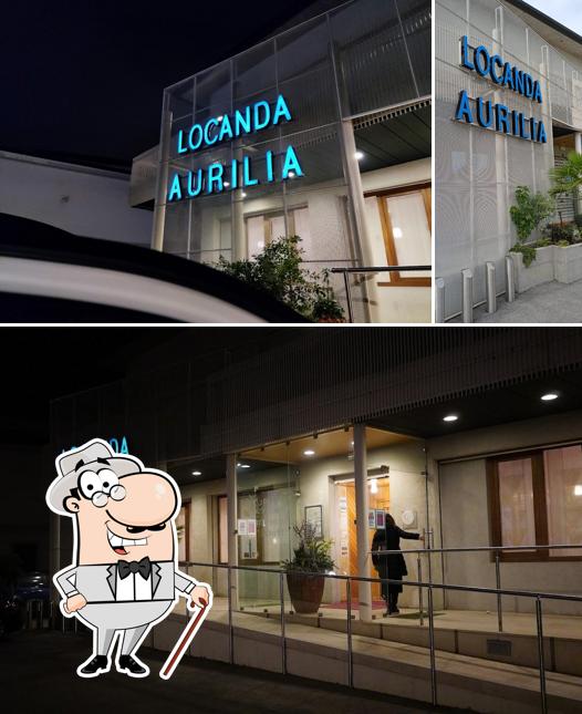Puoi goderti l'aria fresca da seduto all'esterno di Locanda Aurilia