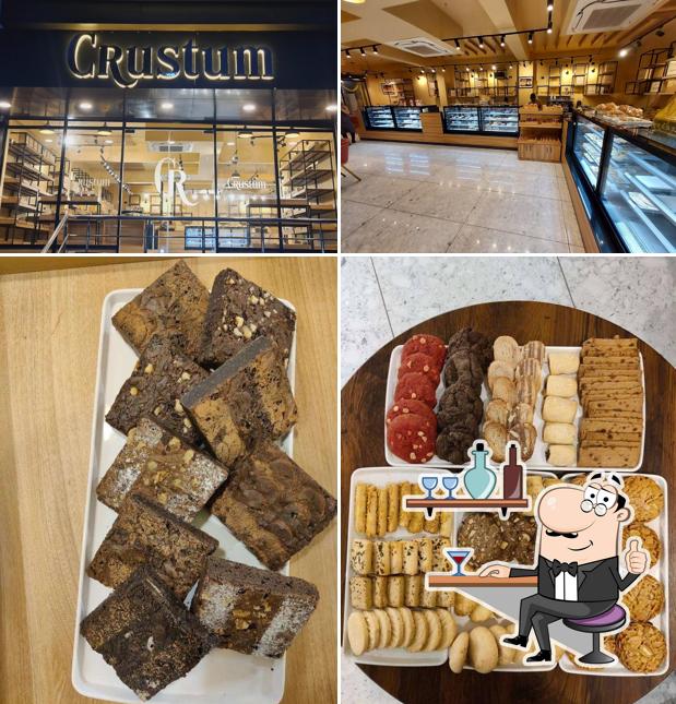 Take a seat at one of the tables at Crustum