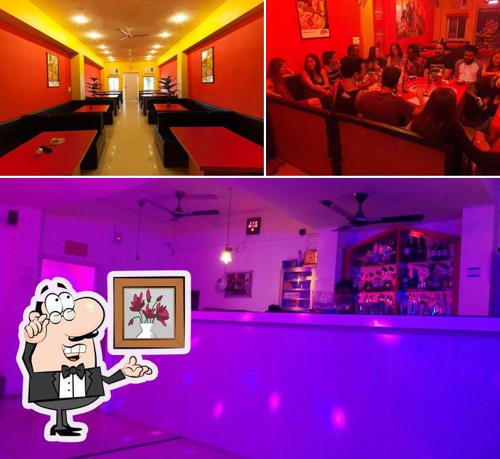 This is the picture showing interior and food at R.R Hotel Bar Non Veg Restaurant and take away pushkar