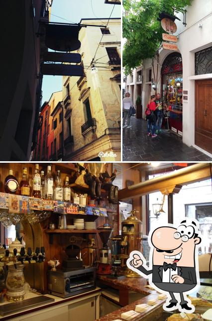 La immagine di esterno e bancone da bar da Osteria dalla Gigia