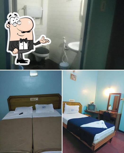 Take a seat at one of the tables at Sri Krishna Vilas Hotels