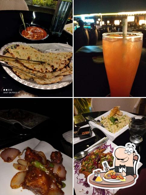 Order pizza at La Cabana Rooftop Bar & Grill